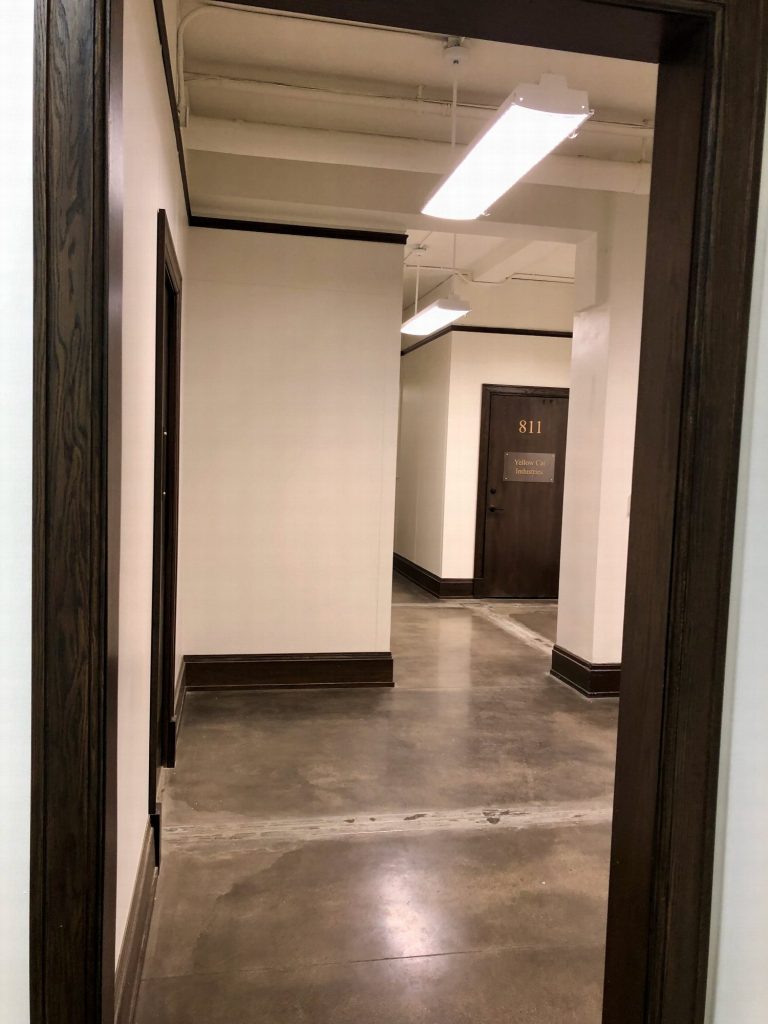 Step 7: Go through this door towards the end of the hall